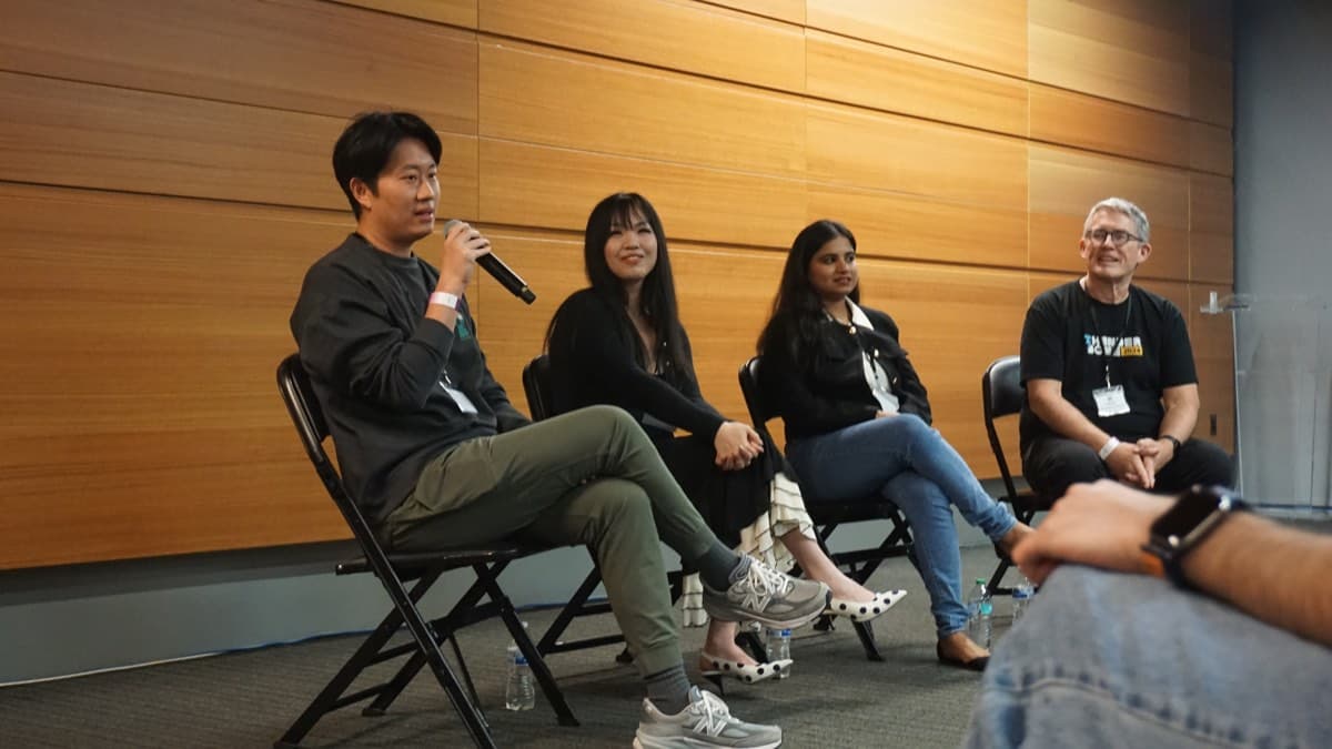 Panelists sharing industry journeys